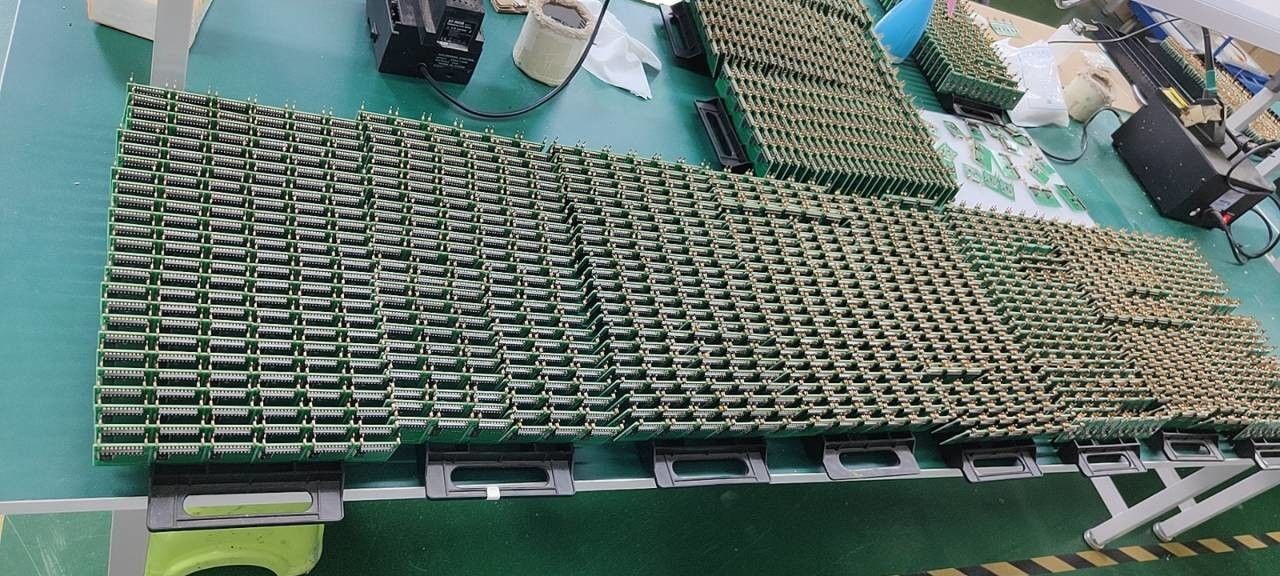 Shenzhen Jutai Comm Co., Ltd. ligne de production du fabricant